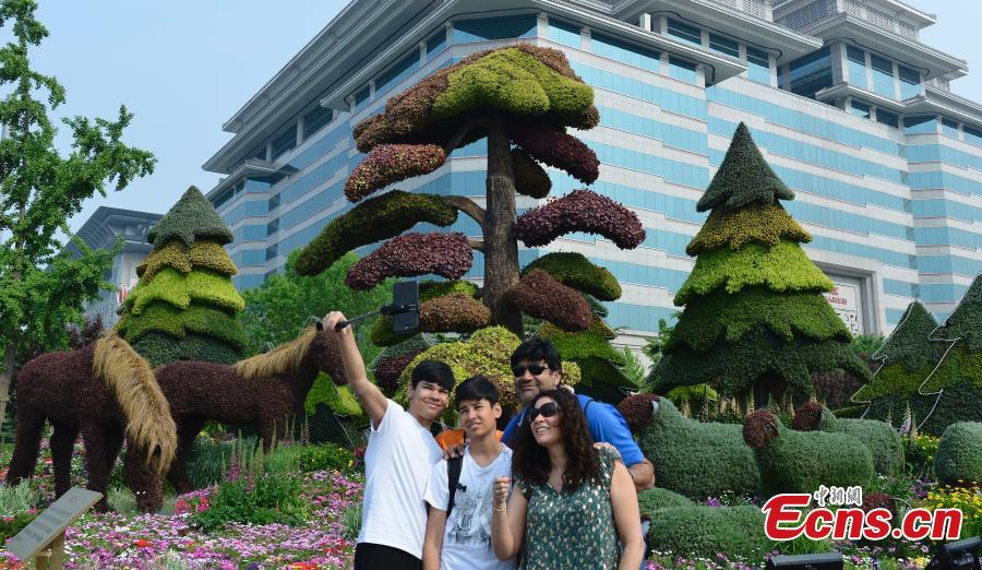 Decorative floral arrangements are installed all over Beijing to welcome the second Belt and Road Forum for International Cooperation (BRF), April 22, 2019. The theme of the second BRF, to be held from April 25 to 27, is, \