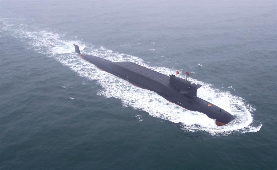 Aerial photo taken on April 23, 2019 shows a new type of nuclear submarine of the Chinese People\'s Liberation Army (PLA) Navy on the sea off Qingdao, east China\'s Shandong Province. (Xinhua/Ju Zhenhua)