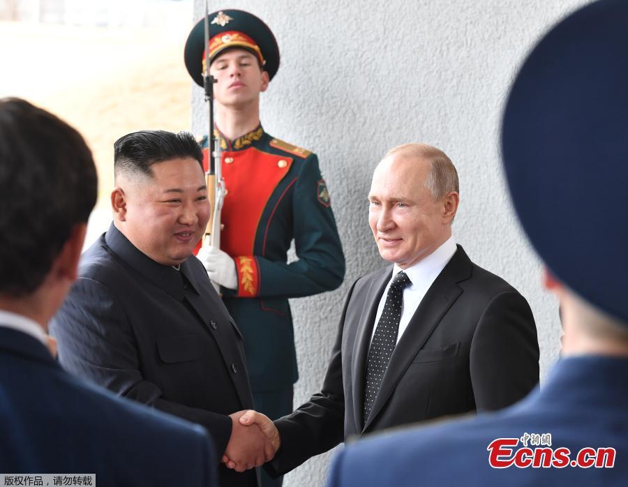Russian President Vladimir Putin and DPRK top leader Kim Jong-un shake hands before their talks at the Far Eastern Federal University campus at Russky Island in the city of Vladivostok, Russia, April 25, 2019. (Photo/Agencies)