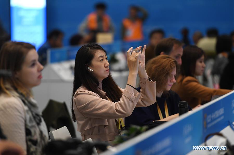 Media gather at the China National Convention Center to report the opening ceremony of the Second Belt and Road Forum for International Cooperation in Beijing, capital of China, April 26, 2019. (Xinhua/Ju Huanzong)