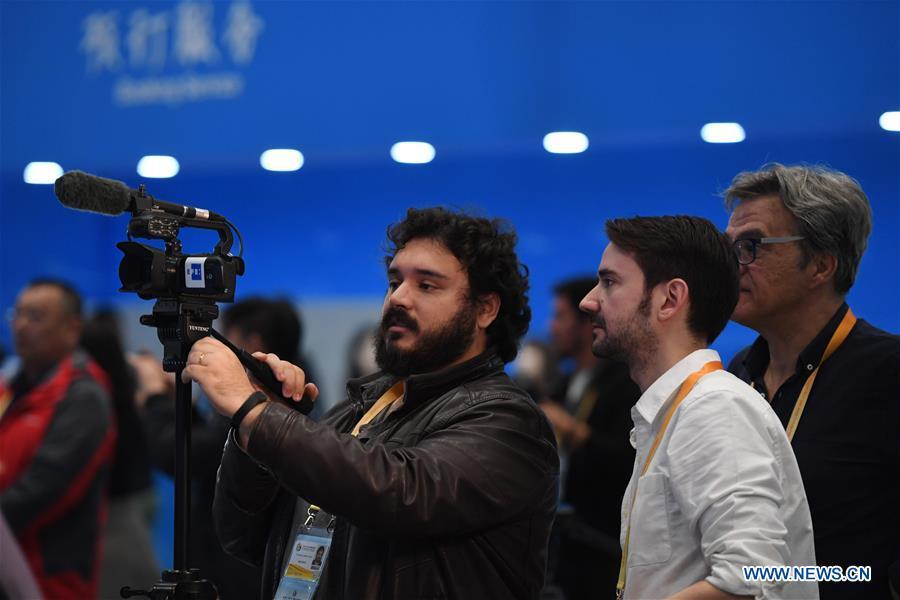 Media gather at the China National Convention Center to report the opening ceremony of the Second Belt and Road Forum for International Cooperation in Beijing, capital of China, April 26, 2019. (Xinhua/Ju Huanzong)