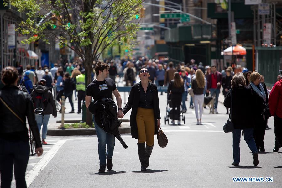 People walk on Broadway during the Car Free Earth Day 2019 in New York, the United States, April 27, 2019. The annual event was created to help raise awareness about environmentally friendly ways to get around town. (Xinhua/Michael Nagle)