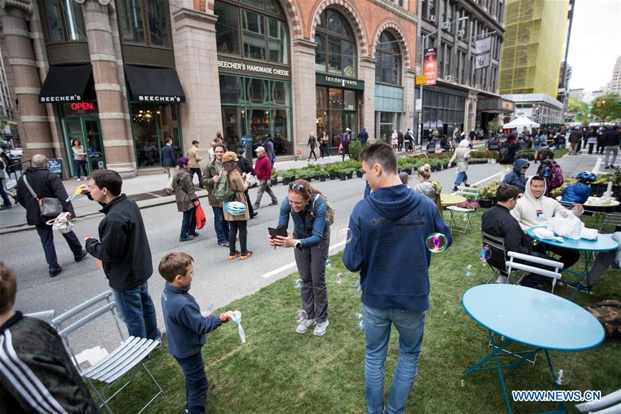People enjoy their leisure time during the Car Free Earth Day 2019 in New York, the United States, April 27, 2019. The annual event was created to help raise awareness about environmentally friendly ways to get around town. (Xinhua/Michael Nagle)