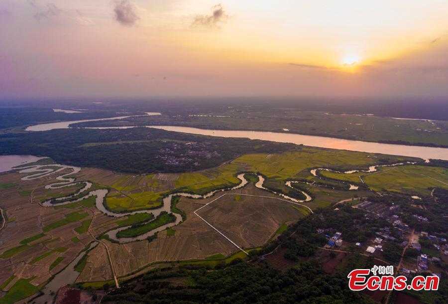Aerial view shows the Sanshiliuquxi (36-bend stream) wetland in Yunlong Town, Haikou City, Hainan Province, April 28, 2019. Known for its rich flora and fauna as well as river bends, the wetland park will cover an area of 316.7 hectares, according to plans. (Photo: China News Service/Luo Yunfei)