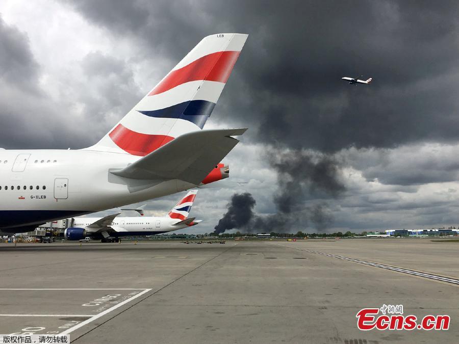 Smoke from a fire is seen at Heathrow Airport in London, Britain April 28, 2019 in this picture obtained from social media. A series of explosions near the airport has caused travel chaos. (Photo/Agencies)