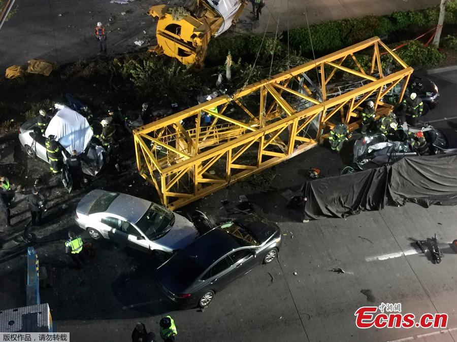 Emergency crews work at the scene of a construction crane collapse where several people were killed and others were injured Saturday, April 27, 2019, in the South Lake Union neighborhood of Seattle. The crane collapsed near the intersection of Mercer Street and Fairview Avenue pinning cars underneath it near Interstate 5. (Photo/Agencies)