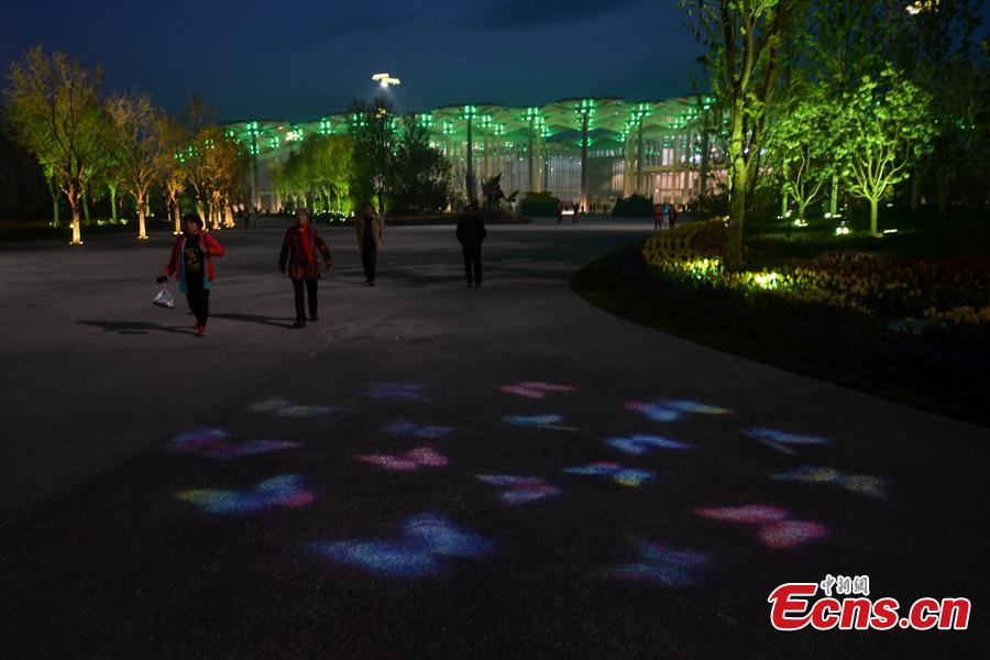The light show at the International Pavilion during the 2019 Beijing International Horticultural Exhibition in Yanqing District of Beijing, China, April 29, 2019. The expo, which is open from April 29 to Oct. 7, will house exhibits related to flower, fruit and vegetable farming at the foot of the Great Wall in Beijing. More than 110 countries and international organizations as well as more than 120 non-official exhibitors have confirmed their participation, marking the highest attendance in the expo\'s history. (Photo: China News Service/Cui Nan)