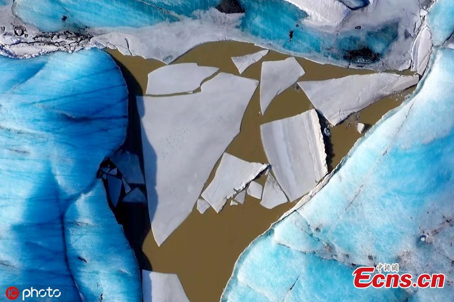 A drone footage shows the breathtaking glacier in Iceland. Italian photographer Stefano Tiozzo, 33, filmed a series of unique aerial images of the Vatnajokull glacier throughout February 2019. It is the largest ice cap in Europe by volume and has a large core measuring almost a kilometre (0.6 miles) in thickness. (Photo/IC)