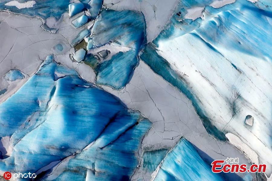 A drone footage shows the breathtaking glacier in Iceland. Italian photographer Stefano Tiozzo, 33, filmed a series of unique aerial images of the Vatnajokull glacier throughout February 2019. It is the largest ice cap in Europe by volume and has a large core measuring almost a kilometre (0.6 miles) in thickness. (Photo/IC)