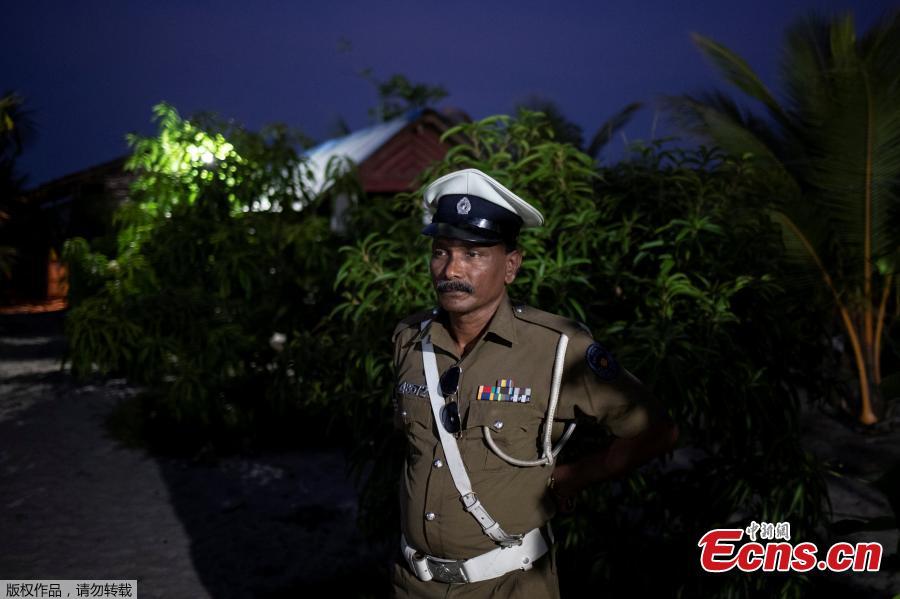A police officer stands inside a training camp allegedly linked to Islamist militants, in Kattankudy near Batticaloa, May 5, 2019. (Photo/Agencies)