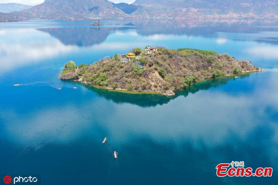 Photo taken on May 7, 2019 shows the natural scenery of the Lugu Lake between the Ninglang county of Yunnan Province and the Yanyuan county of Sichuan Province. (Photo/IC)