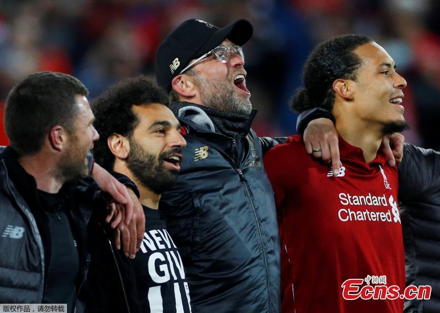 Liverpool\'s Mohamed Salah (2nd, L), manager Jurgen Klopp (2nd, R) and Virgil van Dijk (1st, R) celebrate after the UEFA Champions League Semi-Final second Leg match between Liverpool FC and FC Barcelona at Anfield in Liverpool, Britain on May 7, 2019. Liverpool won 4-3 on aggregate and reached the final. (Photo/Agencies)