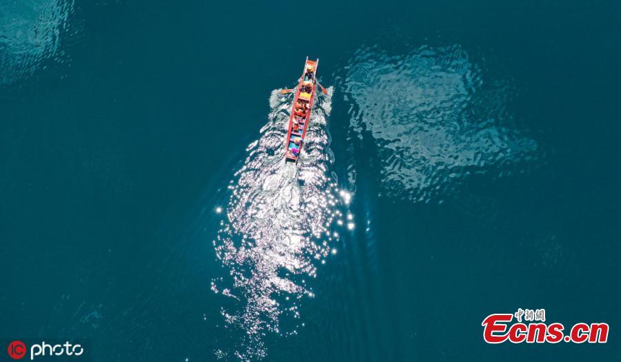 Photo taken on May 7, 2019 shows a boat on the Lugu Lake between the Ninglang county of Yunnan Province and the Yanyuan county of Sichuan Province. (Photo/IC)