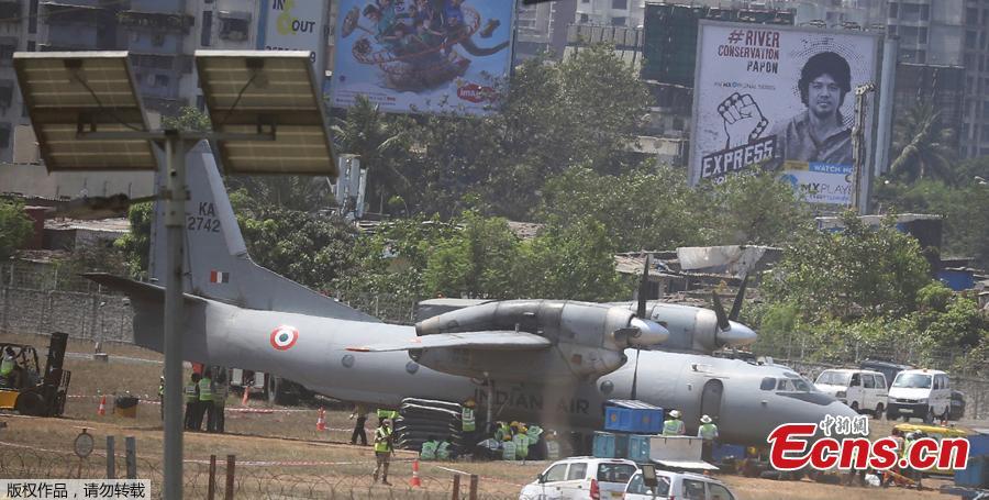 An Indian Air Force transport aircraft that overshot the runway Tuesday night sits on an unpaved surface at the Chhatrapati Shivaji Maharaj International Airport in Mumbai, India, Wednesday, May 8, 2019. Efforts are underway to move the aircraft from the unpaved surface and the same was expected to be accomplished soon, officials said. (Photo / Agencies)