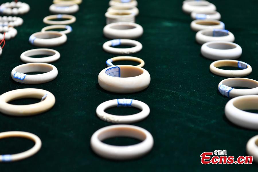 Ivory products seized during checks by Kunming Customs are on display at the Changshui International Airport in Kunming City, Yunnan Province, May 8, 2019. Kunming Customs showcased endangered species and wildlife products seized by staff at the airport. (Photo: China News Service/Ren Dong)