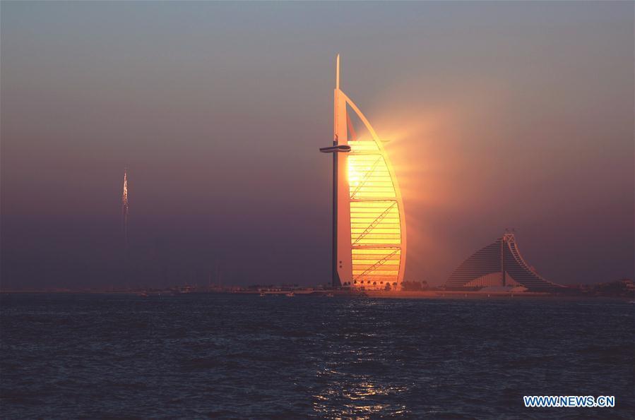Photo taken on Dec. 30, 2016 shows the hotel Burj Al-Arab, literally Arabian tower, in Dubai, the United Arab Emirates. China will hold the Conference on Dialogue of Asian Civilizations starting from May 15. Under the theme of \