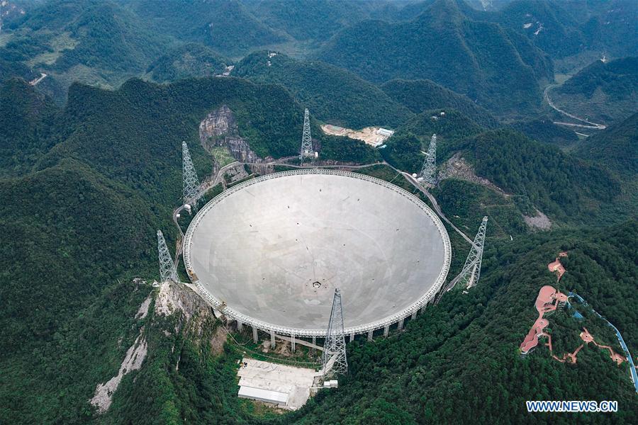 Aerial photo taken on Sept. 10, 2018 shows China\'s Five-hundred-meter Aperture Spherical Radio Telescope (FAST) in southwest China\'s Guizhou Province. China will hold the Conference on Dialogue of Asian Civilizations starting from May 15. Under the theme of \