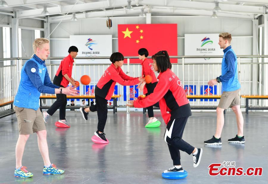 Students train at the Youth Winter Olympic Sports School, or Xuanhua No. 2 Middle School, in Zhangjiakou, Hebei Province, May 9, 2019. The school established in 2015 is the only of its kind to specialize on training of Winter Olympic sports in China. The school has recruited more than 1,200 students, including 200 trained to be competitive skiers. Located some 200km northwest of Beijing, Zhangjiakou will host snowboarding, freestyle skiing, cross-country skiing, ski jumping, Nordic combined and biathlon competitions during the 2022 Winter Games. (Photo: China News Service/Zhai Yujia)