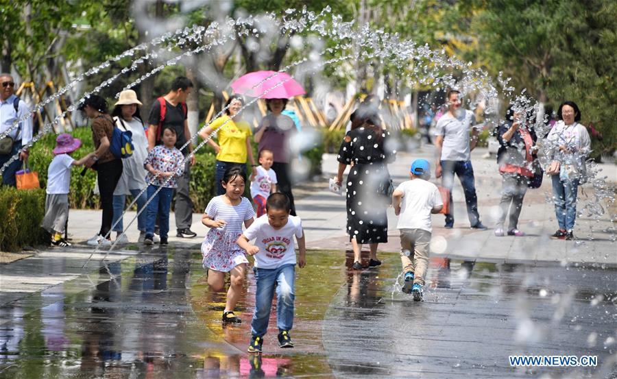 Kids play during the Beijing International Horticultural Exhibition in Yanqing District of Beijing, capital of China, May 10, 2019. The Beijing International Horticultural Exhibition has welcomed a large number of tourists from home and abroad since the opening. As of May 9, it has seen more than 500,000 visitors, according to the Beijing International Horticultural Exhibition Coordination Bureau. (Xinhua/Li Xin)
