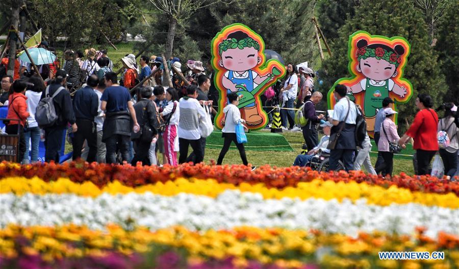 Tourists visit the Beijing International Horticultural Exhibition in Yanqing District of Beijing, capital of China, May 10, 2019. The Beijing International Horticultural Exhibition has welcomed a large number of tourists from home and abroad since the opening. As of May 9, it has seen more than 500,000 visitors, according to the Beijing International Horticultural Exhibition Coordination Bureau. (Xinhua/Li Xin)