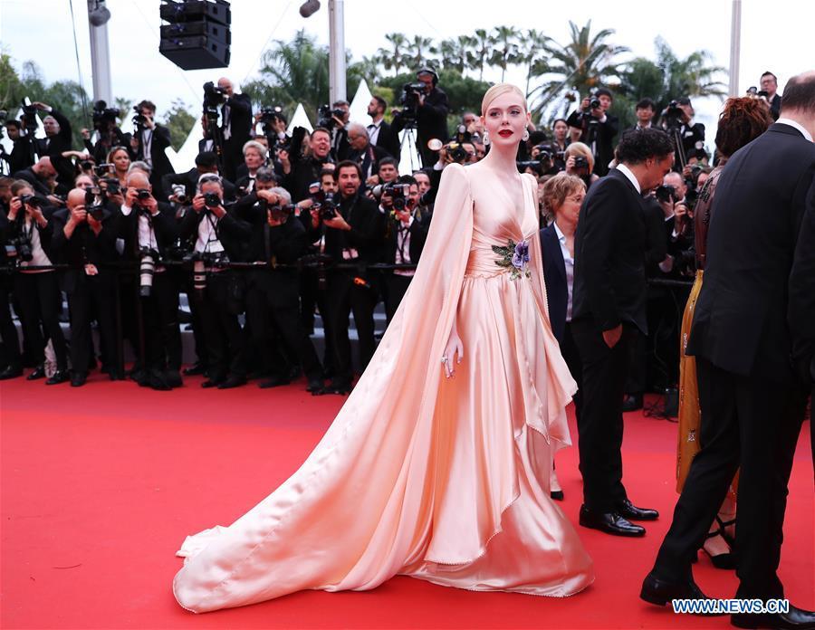 Jury member Elle Fanning arrives on the red carpet for the opening gala during the 72nd Cannes Film Festival at Palais des Festivals in Cannes, France, on May 14, 2019. The 72nd Cannes Film Festival is held here from May 14 to 25. (Xinhua/Gao Jing)
