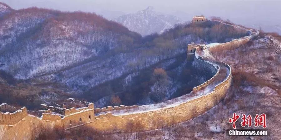 Photo shows the Mutianyu section of the Great Wall in Beijing. While today\'s Great Wall mostly date back to the Ming and Qing Dynasties, parts of the structure go back as early as 500 BCE.  (Photo/China News Service)