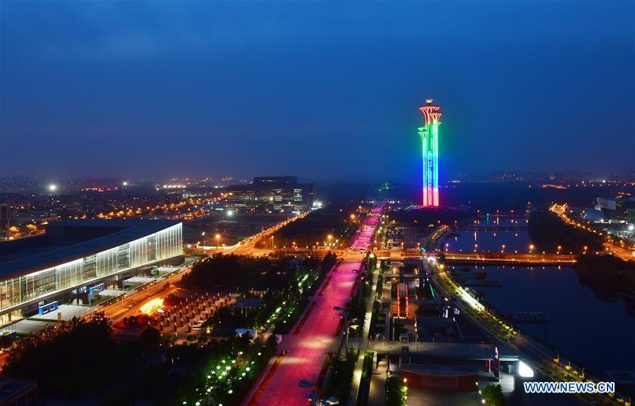 Photo taken on May 14, 2019 shows the night view of the Olympic Tower in Beijing, capital of China. Roads and buildings were illuminated Tuesday evening before the upcoming Conference on Dialogue of Asian Civilizations (CDAC) in Beijing. (Xinhua/Li He)