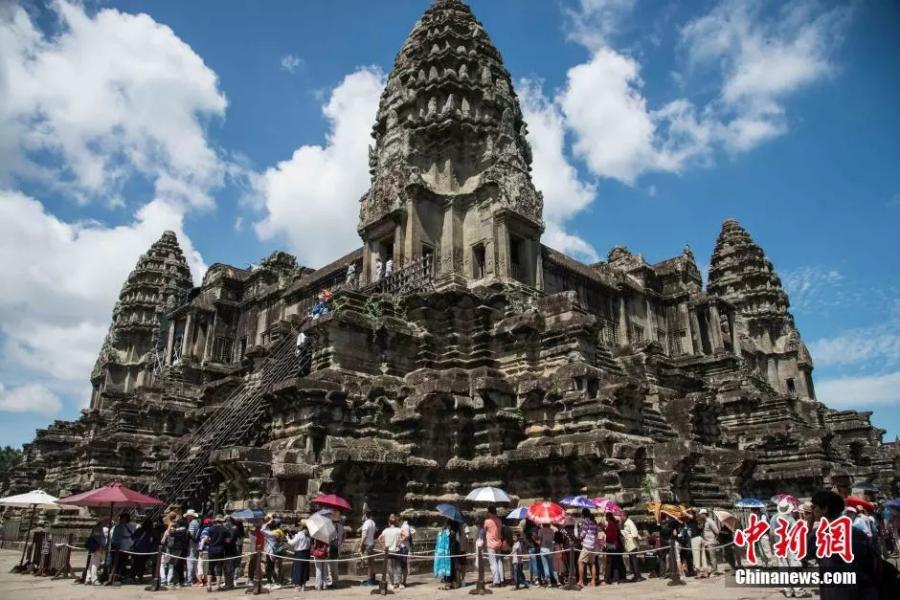 File photo shows the Angkor Wat in Siem Reap, Cambodia. Built between 1113 and 1150 CE, encompassing an area of about 500 acres (200 hectares), Angkor Wat is one of the largest religious monuments ever constructed. Its name means \