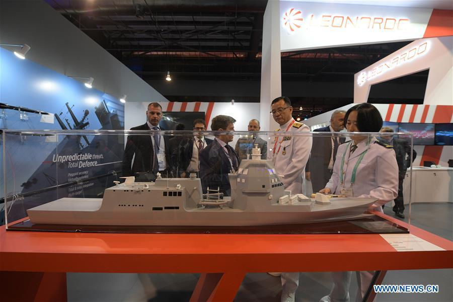 Visitors view exhibits at the 12th International Maritime Defense Exhibition and Conference (IMDEX Asia) in Singapore\'s Changi Exhibition Centre May 14, 2019. Singapore Defense Minister Ng Eng Hen welcomed here Tuesday foreign navies attending the 12th International Maritime Defense Exhibition and Conference (IMDEX Asia) at its opening ceremony. A total of 23 warships from 15 countries sailed their way to IMDEX Asia at the Changi Naval Base, together with 26 chiefs of defense forces and navies, vice chiefs, directors-general of coast guards and senior naval officers. (Xinhua/Then Chih Wey)
