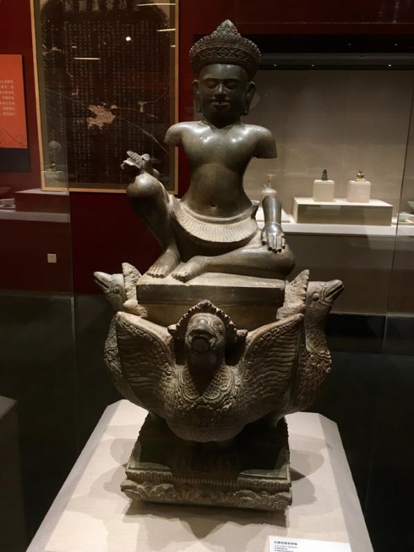 Stone statue of Varuna from Pre Rup, a Hindu temple in Angkor, National Museum of Cambodia. (Photo provided to China Daily) 

\