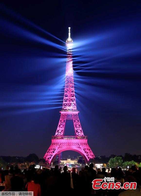 The Eiffel tower is illuminated during a light show to celebrate its 130th anniversary in Paris, France, May, 15, 2019. (Photo/Agencies)