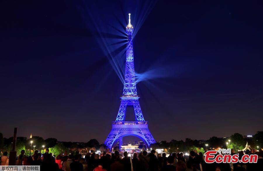 The Eiffel tower is illuminated during a light show to celebrate its 130th anniversary in Paris, France, May, 15, 2019. (Photo/Agencies)