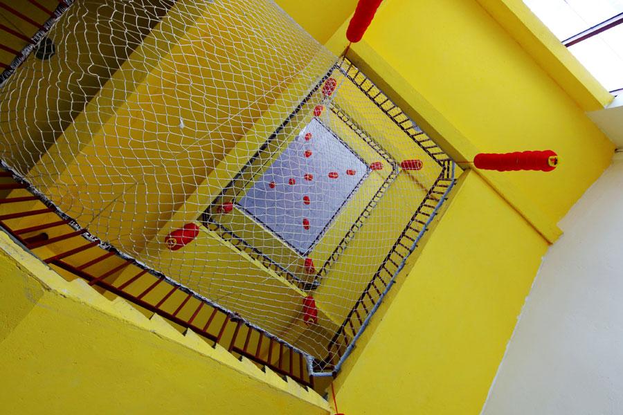 Li Zhenhui, an employee with an interior design company in Guangzhou, has shot photos of more than 400 sets of winding stairs in the city. (Photo by Li Zhenhui/for chinadaily.com.cn)