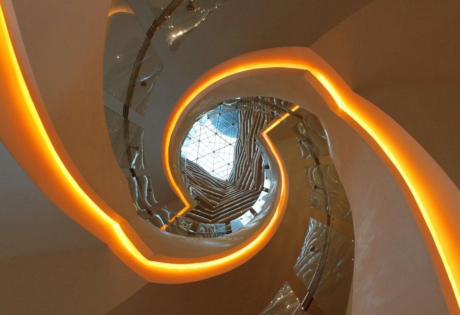 Li Zhenhui, an employee with an interior design company in Guangzhou, has shot photos of more than 400 sets of winding stairs in the city. (Photo by Li Zhenhui/for chinadaily.com.cn)