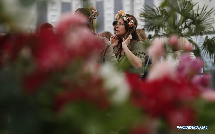 People visit the RHS (Royal Horticultural Society) Chelsea Flower Show press day in London, Britain on May 20, 2019. The annual RHS Chelsea Flower Show will open to the public here from May 21 to 25. (Xinhua/Han Yan)