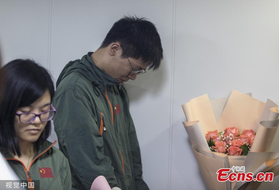 People mourn the loss of colleagues during the attacks in Sri Lanka as Shiyan 3, the ship of the South China Sea Institute of Oceanology at the Chinese Academy of Sciences, returns to Xinzhou port in Guangzhou City, Guangdong Province, May 20, 2019. (Photo/VCG)