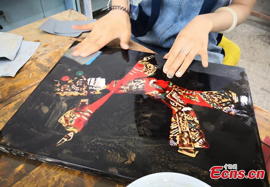 Students and teachers use traditional methods to make lacquerware at the Lanzhou Polytechnic College in Lanzhou City, Northwest China’s Gansu Province. The process of decorating a cup with layers of lacquer usually takes 20 days. Lacquerware refers to a variety of traditional crafts that have lacquer as their surface layer, sometimes with the addition of gold or silver sheets, eggshell, or other materials. (Photo: China News Service/Liu Yutao)