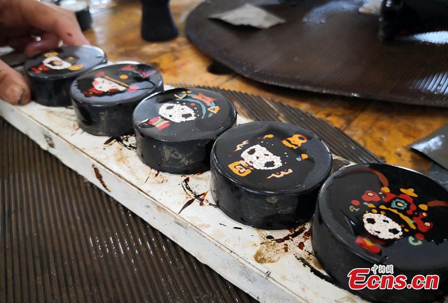Students and teachers use traditional methods to make lacquerware at the Lanzhou Polytechnic College in Lanzhou City, Northwest China’s Gansu Province. The process of decorating a cup with layers of lacquer usually takes 20 days. Lacquerware refers to a variety of traditional crafts that have lacquer as their surface layer, sometimes with the addition of gold or silver sheets, eggshell, or other materials. (Photo: China News Service/Liu Yutao)