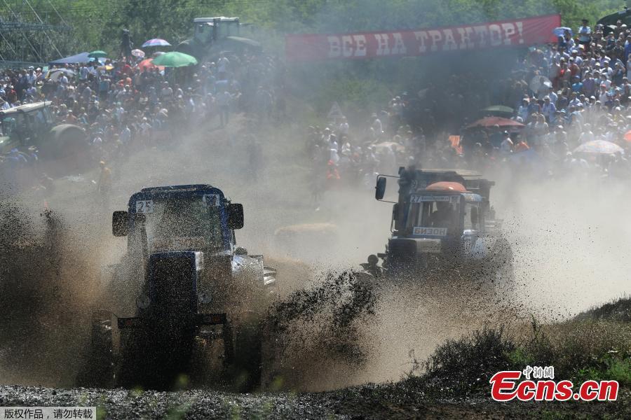 Participants attend a regional?tractor?racing competition Bizon-Track-Show outside of Rostov-on-Don, Russia June 2, 2019.(Photo/Agencies)