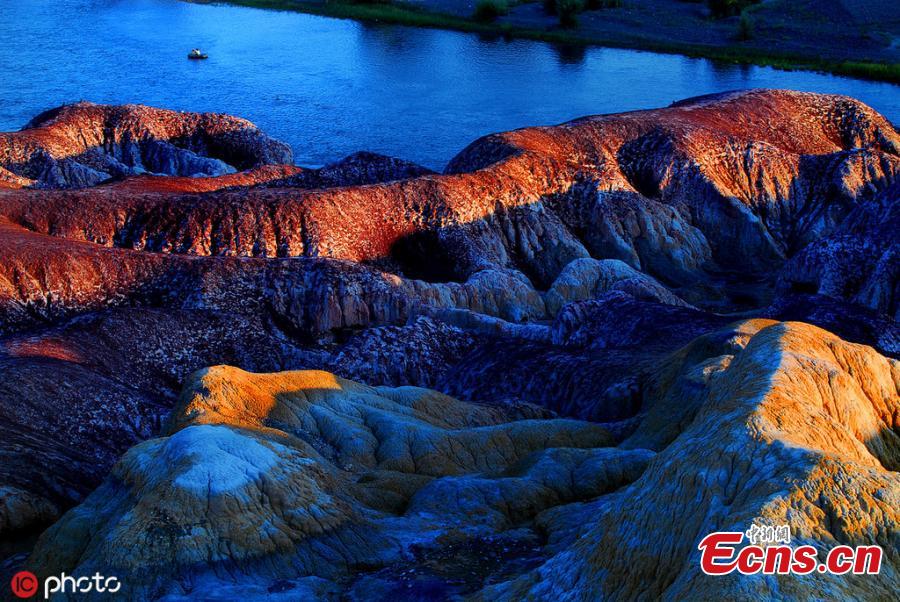 The photo taken on June 5, 2019 shows Wucaitan, also known as the Rainbow Beach in Burqin county, Altay Prefecture, northwest China\'s Xinjiang Uyghur Autonomous Region. The beach is known for its unique landforms created by years of wind and water erosion. (Photo/IC)