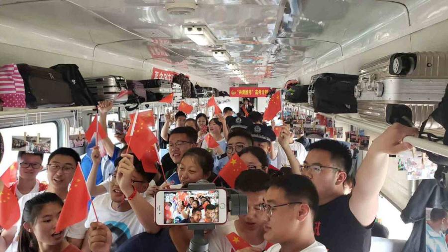 Students set off to Alihe for the national college entrance examination, known as the gaokao, on Wednesday. (Photo provided to chinadaily.com.cn)