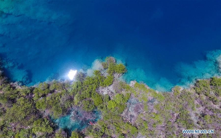 Aerial photo shows a view of Lake Jinghai in the Jiuzhaigou National Park in southwest China\'s Sichuan Province, June 5, 2019. Due to damages caused by the magnitude-7.0 earthquake that hit here on Aug. 8, 2017, the park has been temporarily closed since July 2018 for renovation. (Xinhua/Xue Yubin)