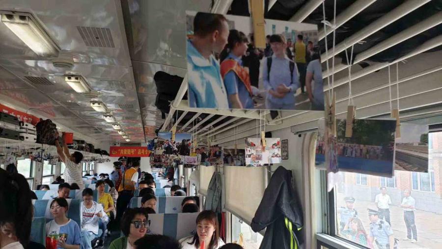 The classic green train carriages have been decorated with red banners urging the students to \