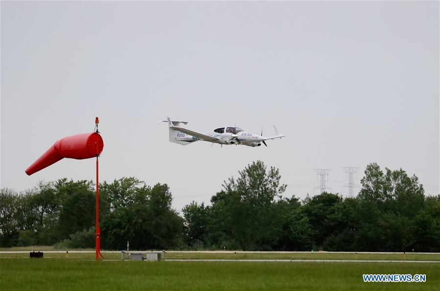 The Diamond DA42 aircraft which Zhang Bo drove for his flight around the world lands at an airport in Chicago, the United States, on June 9, 2019. After flying 68 days and making 50 stops, 57-year-old Bo Zhang completed his second around-the-world flight and landed in Chicago on Sunday morning. On April 2, Zhang kicked off the flight in the same airport in Chicago. In 68 days, he flied through 21 countries in three continents and over three oceans, with total mileage reaching 41,000 kilometers. (Xinhua/Wang Ping)