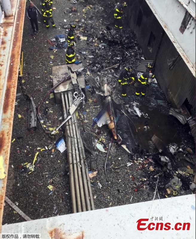 The site of a helicopter crash, Monday, June 10, 2019, in Manhattan, New York. The New York City Fire Department says the pilot of a helicopter that crashed on a Manhattan skyscraper rooftop has died.(Photo/Agencies)