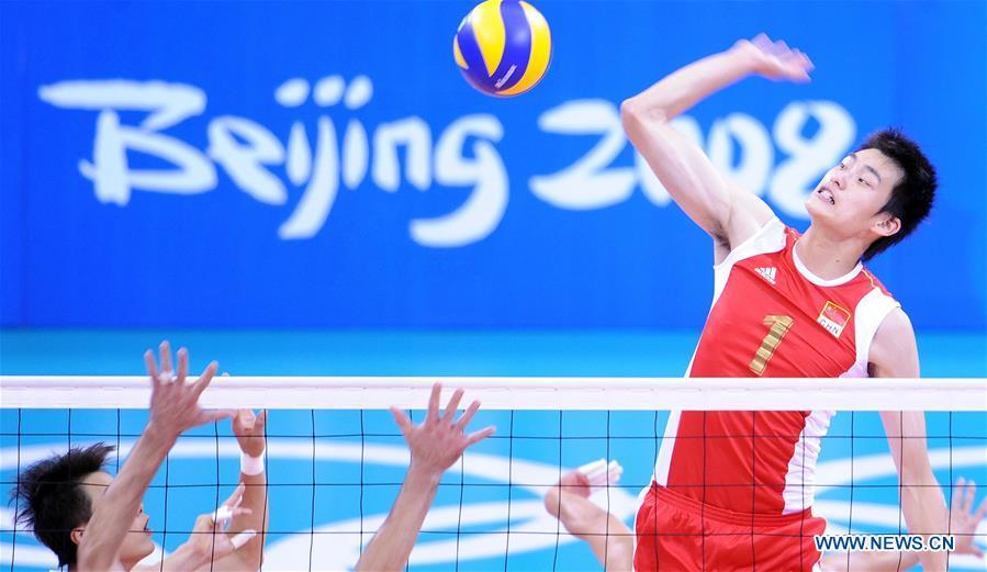 Bian Hongmin of China competes during the men\'s volleyball quarterfinal match against Brazil at the Olympic Games in Beijing, capital of China, Aug. 20, 2008. This year marks the 70th anniversary of the founding of the People\'s Republic of China (PRC). On April 5, 1959, Rong Guotuan won the champion of the men\'s singles event at the 25th ITTF World Table Tennis Championships in Dortmund, Germany, becoming China\'s first ever world champion. Chinese players have made more achievements during the 60 years since then. (Xinhua/Zhao Zhongzhi)