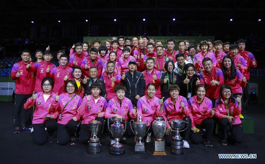 The Chinese table tennis team poses for a group photo after the 2019 ITTF World Table Tennis Championships in Budapest, Hungary, April 28, 2019. This year marks the 70th anniversary of the founding of the People\'s Republic of China (PRC). On April 5, 1959, Rong Guotuan won the champion of the men\'s singles event at the 25th ITTF World Table Tennis Championships in Dortmund, Germany, becoming China\'s first ever world champion. Chinese players have made more achievements during the 60 years since then. (Xinhua/Han Yan)