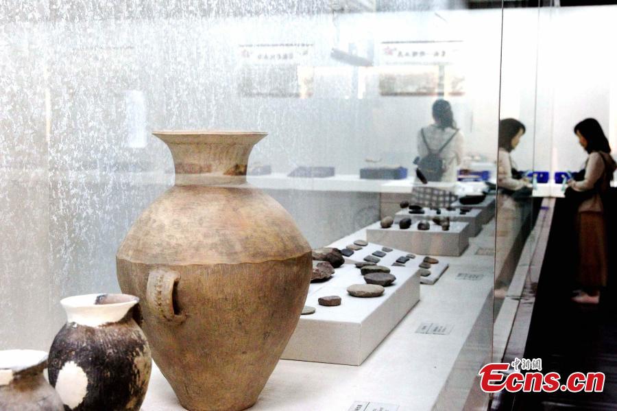 Some 192 artifacts made of stone, bone, pottery and bronze, unearthed from the Shenna site, are on display at an exhibition at the Xining Museum in Xining City, Northwest China’s Qinghai Province, June 12, 2019. Shenna is located on the bank of the Beichuan River in Xining, covering an area of approximately 100,000 square meters. It was home to the Qijia culture approximately 4,000 years ago. (Photo: China News Service/ Zhang Tianfu)