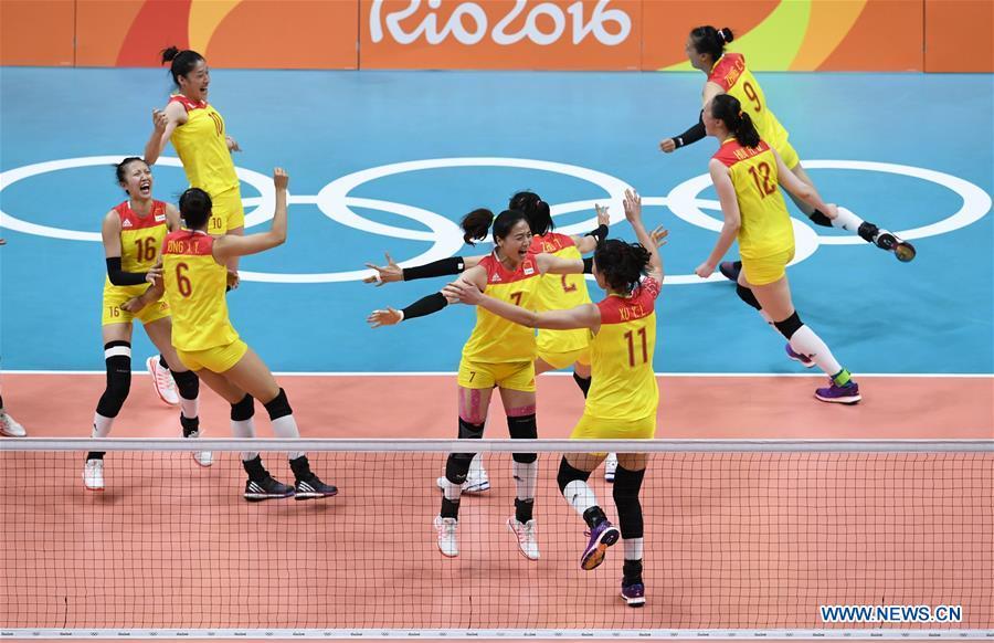 Members of the women\'s volleyball team of China celebrate after winning the gold medal at the Olympic Games in Rio de Janeiro, Brazil, Aug. 20, 2016. This year marks the 70th anniversary of the founding of the People\'s Republic of China (PRC). On April 5, 1959, Rong Guotuan won the champion of the men\'s singles event at the 25th ITTF World Table Tennis Championships in Dortmund, Germany, becoming China\'s first ever world champion. Chinese players have made more achievements during the 60 years since then. (Xinhua/Qi Heng)