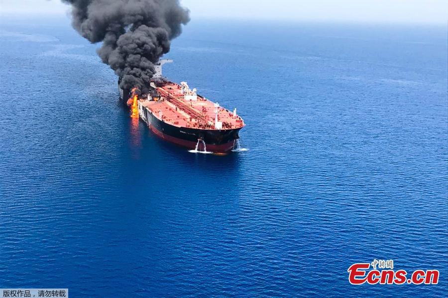 Two oil tankers have been attacked in the Gulf of Oman, leaving one ablaze and both adrift, raising regional tensions a month after a similar incident involving four tankers. The attacks occurred along one of the world’s busiest oil routes, and the price of oil surged as the initial reports emerged on June 13, 2019.(Photo/Agencies)